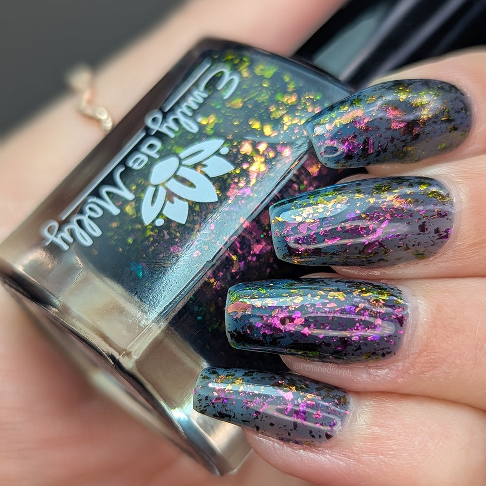 Sheer Tint Druzy - A navy jelly nail polish with iridescent flakes