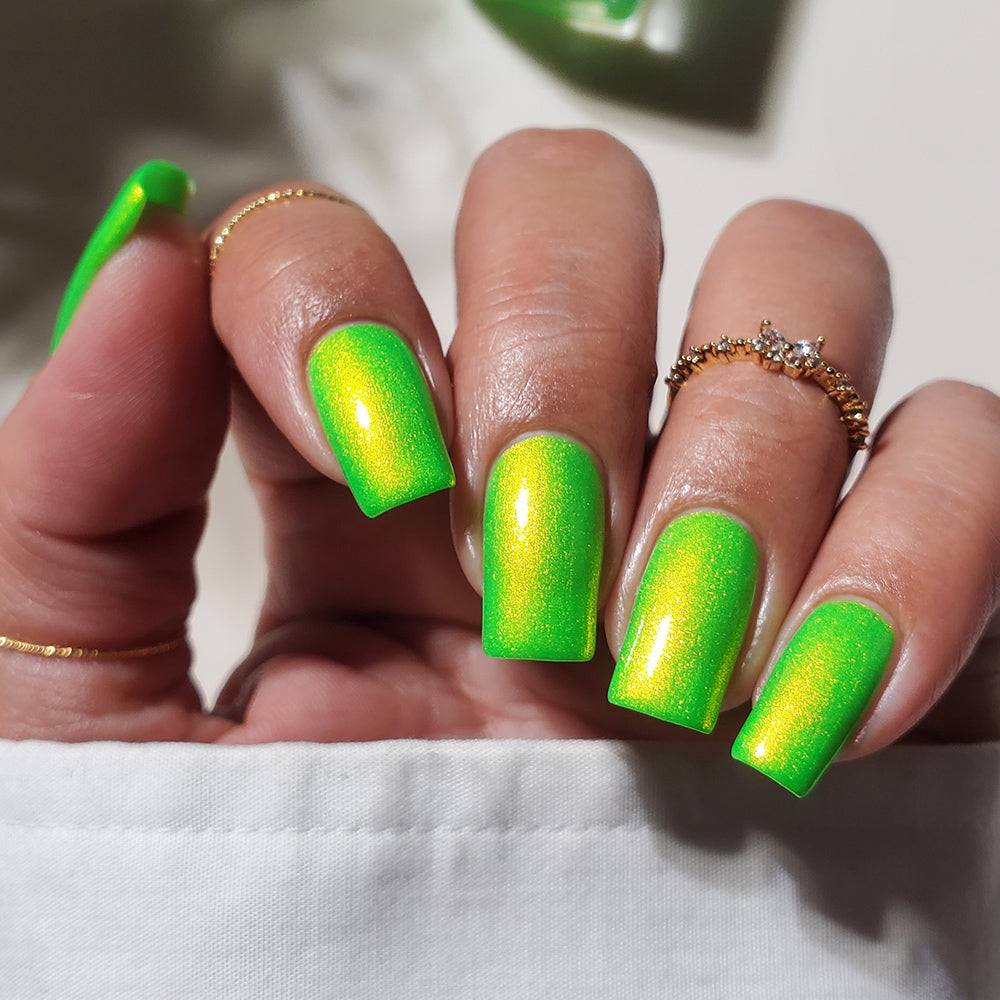 Behind Again - A neon green nail polish with aurora shimmer