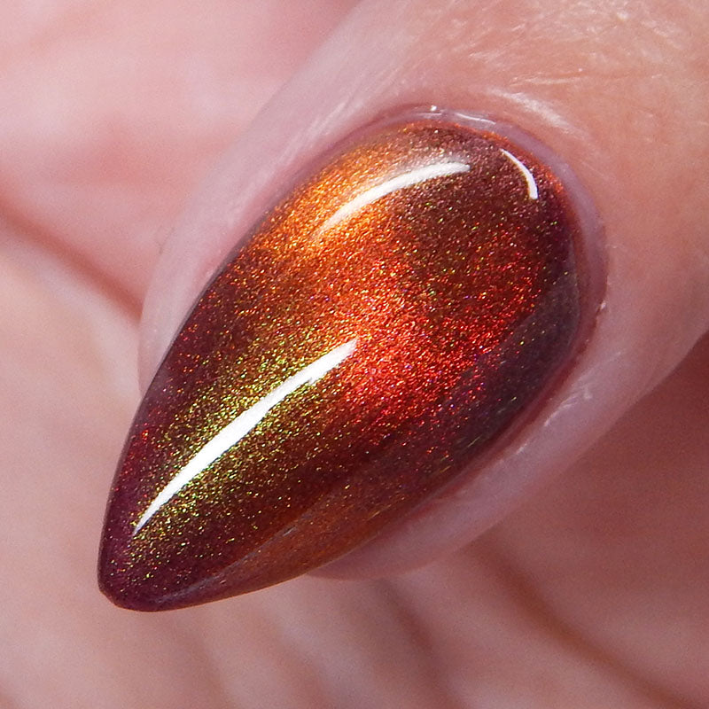 Verdant Vortex - An orange magnetic nail polish with shimmer