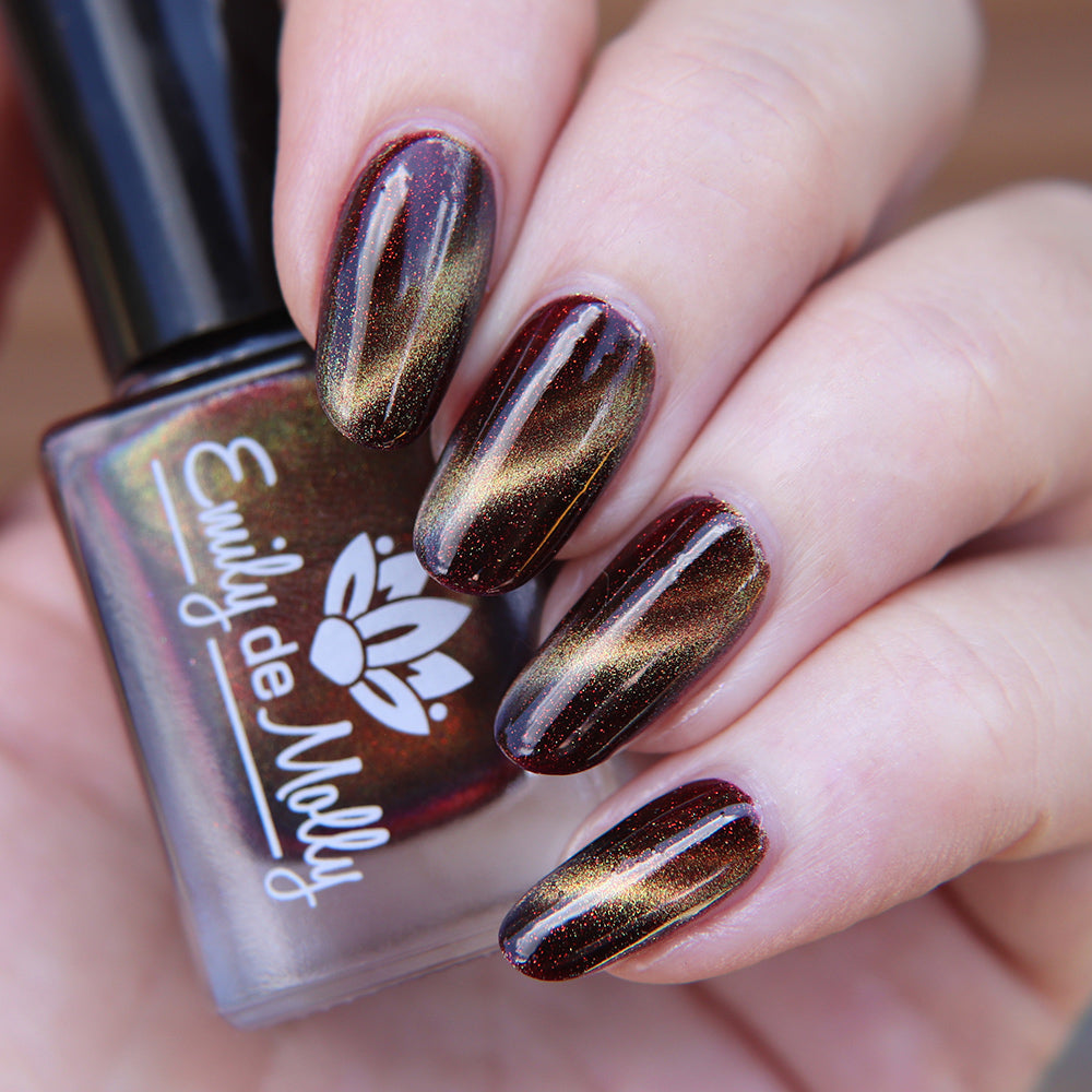 Empty Within - A burgundy shimmer nail polish with magnetic effect