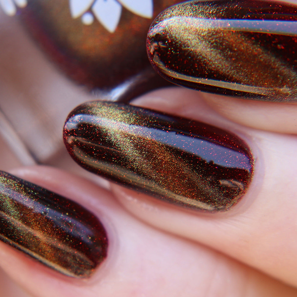 Empty Within - A burgundy shimmer nail polish with magnetic effect