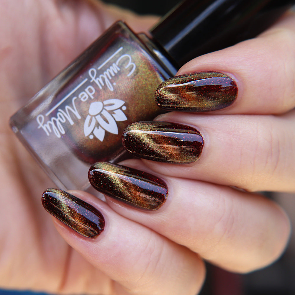 Empty Within - A burgundy shimmer nail polish with magnetic effect