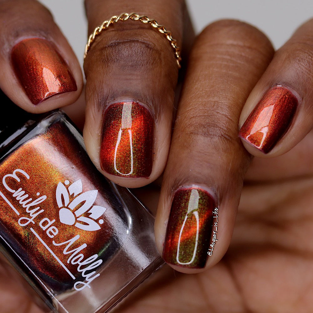 Verdant Vortex - An orange magnetic nail polish with shimmer