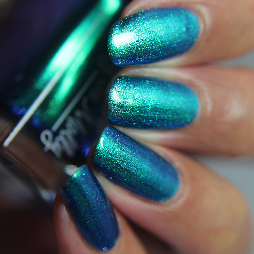 Core Memory - A deep blue nail polish with a green to blue
