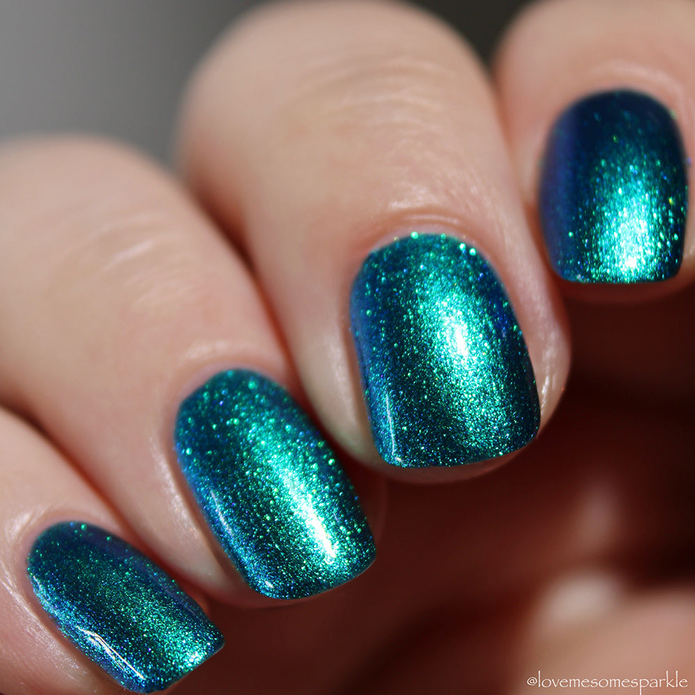 Core Memory - A deep blue nail polish with a green to blue
