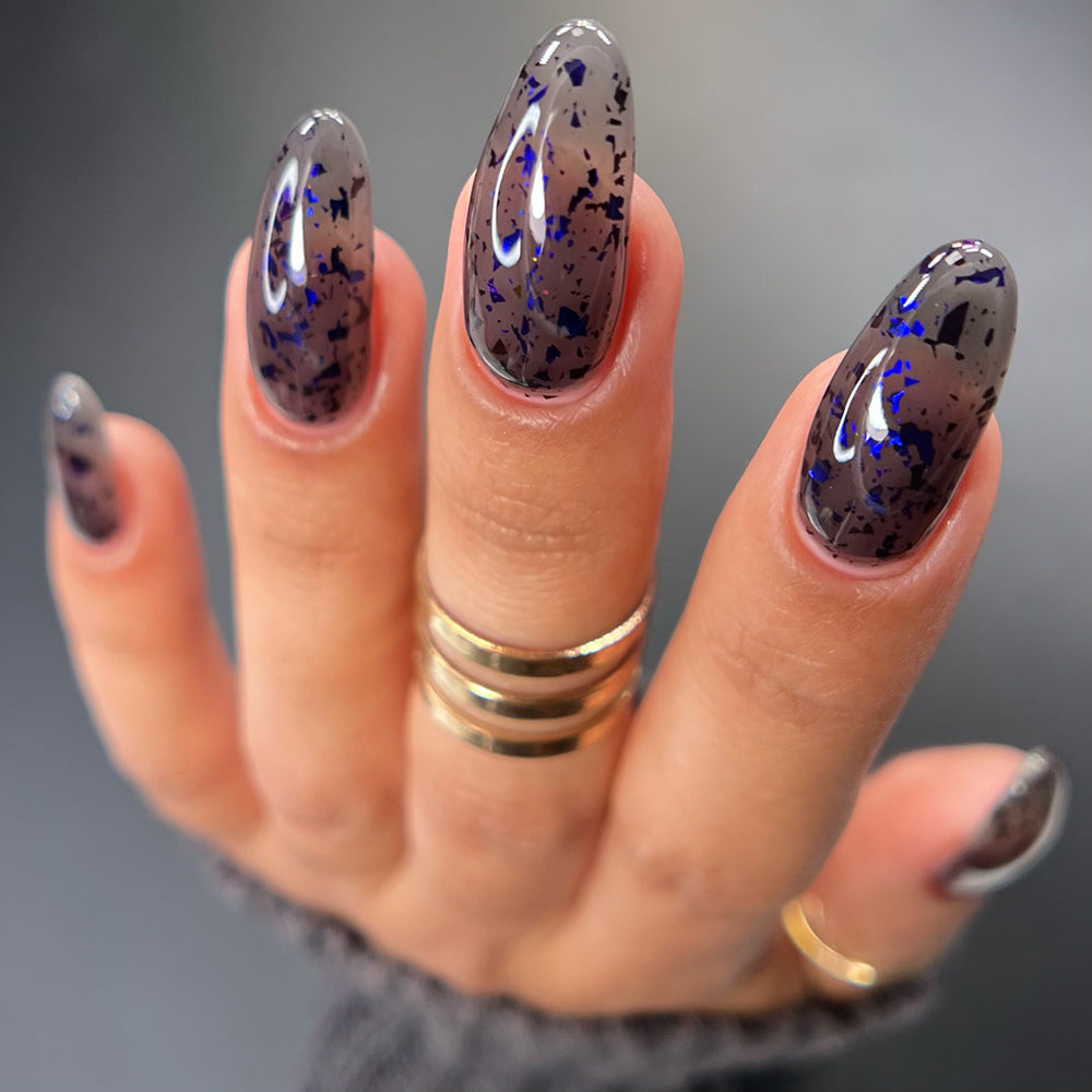 Sheer Tint Nightshade - A sheer base with multichrome flakes