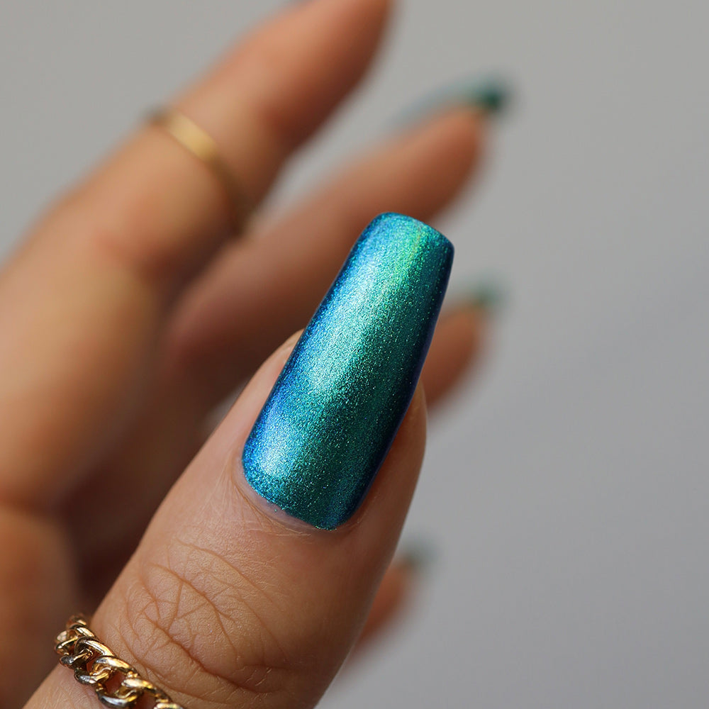 Core Memory - A deep blue nail polish with a green to blue