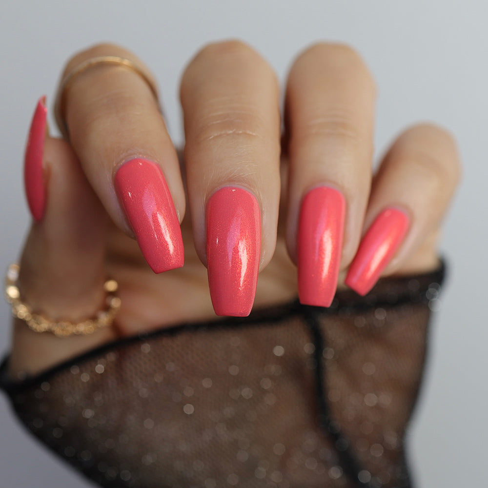 Not Quite There - A bright coral nail polish with shimmer