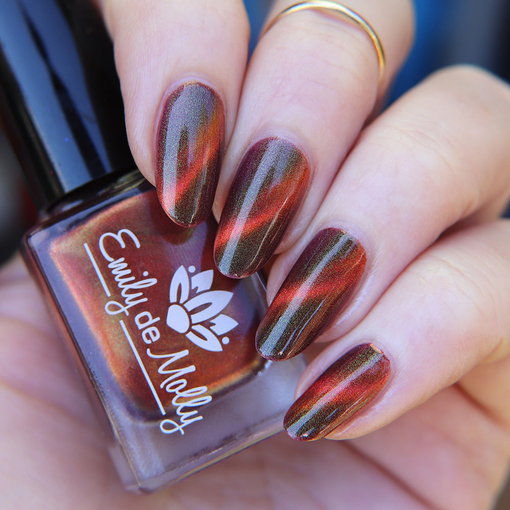 Verdant Vortex - An orange magnetic nail polish with shimmer